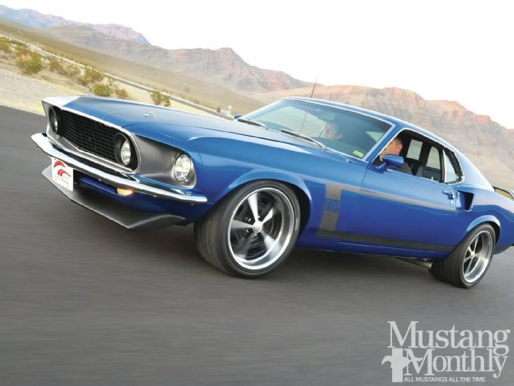 blue1969-mustang-coyote-wildfront-side-view.jpg