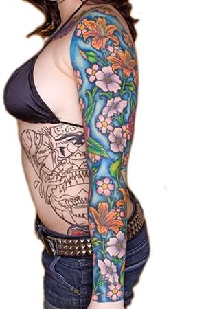 girls with arm tattoos. Colorful Upper Arm Tattoo