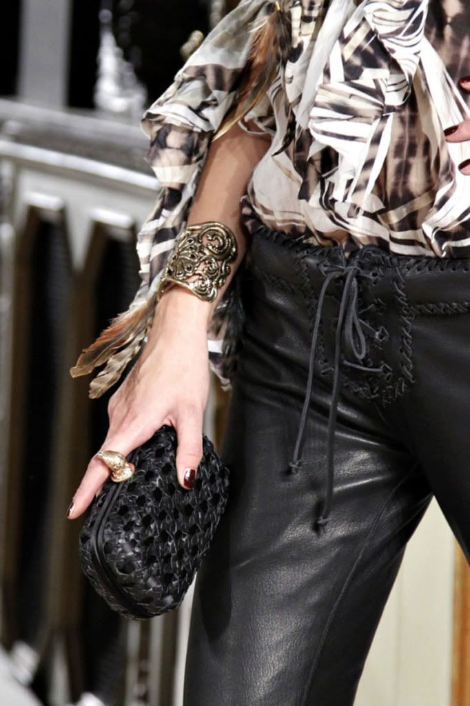 clutch,leather pants,frills